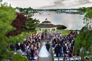 Danversport Yacht Club Asian outdoor wedding. Wedding couple photos at Christopher Columbus Park near Boston waterfront harbor